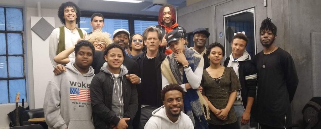 Kevin Bacon with students at The Door